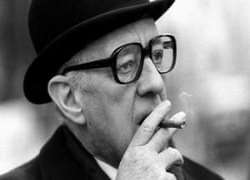 Alec Guinness smoking
